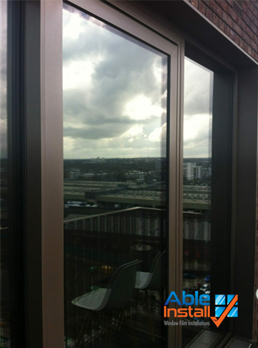 Optitune-22-installed-at-high-rise-in-Battersea Twin S.E.R.F. window film installation in Battersea