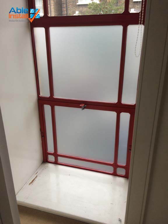 After-image-of-crittal-window-at-Arsenel-FC-old-ground-at-Highburynorth-London-with-oplescent-privacy-film-installed privacy window film - Able Install